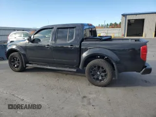 2020 Nissan Frontier Pro-4X with VIN 1N6ED0EB3LN710650, listed as a Copart auction lot 77419464 with 97,399 mi miles and Salvage title. Bid and sale history available at DreamBid. Image 2.