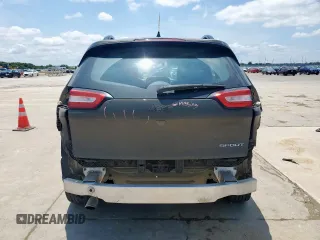 2015 Jeep Cherokee Sport with VIN 1C4PJLAB5FW684191, listed as a Copart auction lot 64256405 with 159,289 mi miles and Salvage title. Bid and sale history available at DreamBid. Image 6.