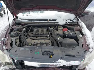 2011 Ford Taurus SEL with VIN 1FAHP2EW4BG115630, listed as a IAAI auction lot 41276945 with 166,867 mi miles. Bid and sale history available at carsss.com. Image 10.