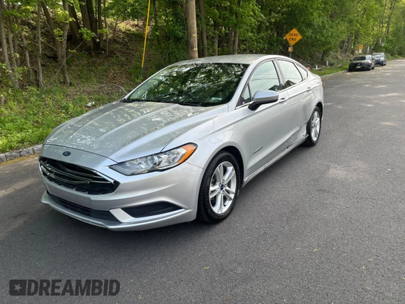 2018 Ford Fusion SE z VIN 3FA6P0LU9JR208728, wystawiony jako Copart lot #56345445 z przebiegiem 183 982 mil mil oraz Czysty tytuł • Clean title. Historia ofert i sprzedaży dostępna na DreamBid. Obrazek 2.