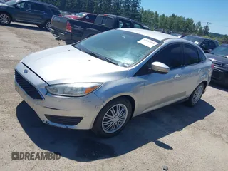 2016 Ford Focus SE with VIN 1FADP3F24GL286330, listed as a IAAI auction lot 42433516 with 130,814 mi miles and . Bid and sale history available at DreamBid. Image 2.