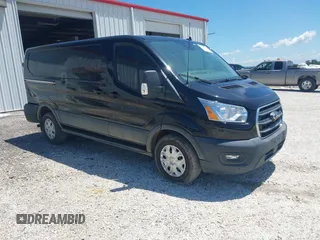 2020 Ford Transit Cargo z VIN 1FTYE1Y89LKB76753, wystawiony jako IAAI lot #42468252 z przebiegiem 53 193 mil mil oraz . Historia ofert i sprzedaży dostępna na DreamBid. Obrazek 1.