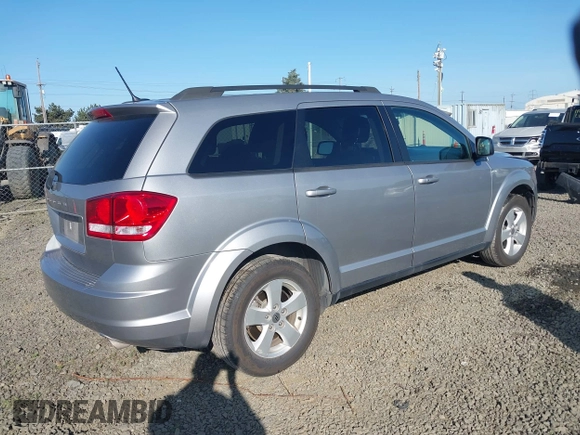 2018 Dodge Journey SE with VIN 3C4PDDAG9JT189824, listed as a IAAI auction lot 42208115 with 97,035 mi miles and . Bid and sale history available at DreamBid. Image 4.