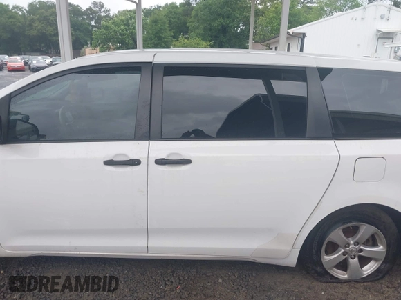 2014 Toyota Sienna L with VIN 5TDZK3DC9ES473780, listed as a IAAI auction lot 42245274 with 203,060 mi miles and . Bid and sale history available at DreamBid. Image 15.