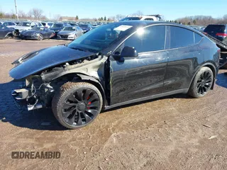 2022 Tesla Model Y Performance with VIN 7SAYGDEFXNF313636, listed as a IAAI auction lot 41660019 with 30,258 mi miles and . Bid and sale history available at DreamBid. Image 24.