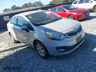 2014 Kia Rio EX with VIN KNADN4A33E6338674, listed as a IAAI auction lot 41659426 with 208,967 mi miles. Bid and sale history available at carsss.com. Image 1.