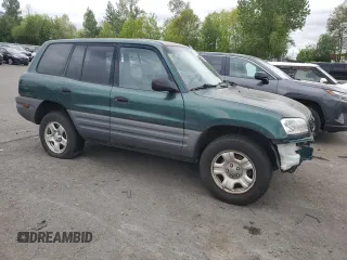 1999 Toyota RAV4 with VIN JT3GP10V2X0037464, listed as a Copart auction lot 54732085 with 306,550 mi miles and Clean Title. Bid and sale history available at DreamBid. Image 4.