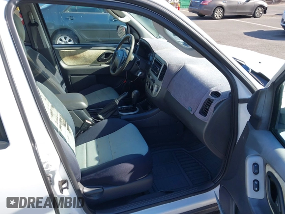 2006 Ford Escape XLT with VIN 1FMCU03116KA05836, listed as a IAAI auction lot 42310284 with 128,620 mi miles and . Bid and sale history available at DreamBid. Image 5.