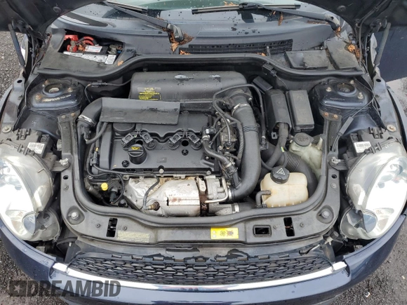 2012 MINI Convertible S z VIN WMWZP3C53CT550188, wystawiony jako Copart lot #88769895 z przebiegiem 130 696 mil mil oraz Nie do naprawy • Non repairable. Historia ofert i sprzedaży dostępna na DreamBid. Obrazek 11.
