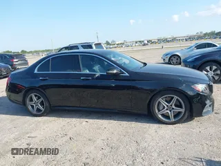 2018 Mercedes-Benz E 300 with VIN WDDZF4JB5JA380872, listed as a IAAI auction lot 42048785 with 94,574 mi miles and . Bid and sale history available at DreamBid. Image 13.
