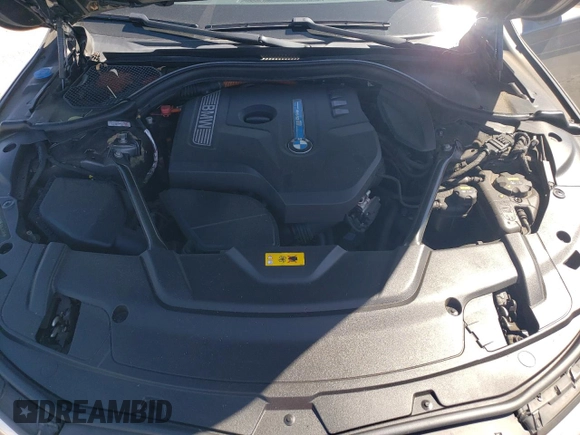 2018 BMW 7 Series 740e xDrive with VIN WBA7J2C55JG938385, listed as a Copart auction lot 49109985 with 81,567 mi miles and Salvage Title. Bid and sale history available at DreamBid. Image 12.