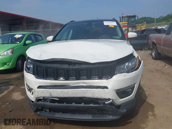 2020 Jeep Compass Latitude z VIN 3C4NJDBB6LT157841, wystawiony jako IAAI lot #42484052 z przebiegiem 52 610 mil mil oraz . Historia ofert i sprzedaży dostępna na DreamBid. Obrazek 12.