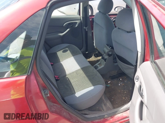 2004 Ford Focus SE z VIN 1FAFP34384W120763, wystawiony jako IAAI lot #42339251 z przebiegiem 262 686 mil mil oraz . Historia ofert i sprzedaży dostępna na DreamBid. Obrazek 8.