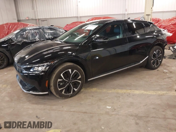2022 Kia EV6 Wind z VIN KNDC3DLC8N5075492, wystawiony jako IAAI lot #41671331 z przebiegiem 22 122 mil mil oraz . Historia ofert i sprzedaży dostępna na DreamBid. Obrazek 21.