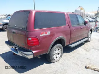 2003 Ford F-150 XLT with VIN 1FTRW08L63KA20475, listed as a IAAI auction lot 42610305 with Not provided miles and . Bid and sale history available at DreamBid. Image 4.