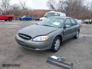 2003 Ford Taurus SEL with VIN 1FAFP56S13A124987, listed as a IAAI auction lot 41626121 with 197,237 mi miles. Bid and sale history available at carsss.com. Image 2.