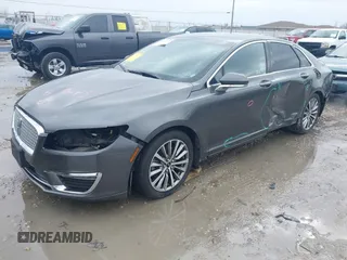 2017 Lincoln MKZ Hybrid Premiere with VIN 3LN6L5KU6HR609891, listed as a IAAI auction lot 41712359 with 112,349 mi miles. Bid and sale history available at carsss.com. Image 2.