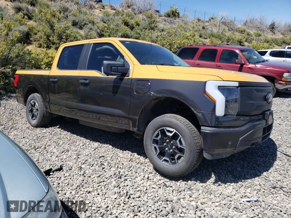 2023 Ford F-150 Lightning Pro with VIN 1FTVW1EL7PWG11261, listed as a Copart auction lot 47032775 with Not Provided miles and Salvage Title. Bid and sale history available at DreamBid. Image 4.