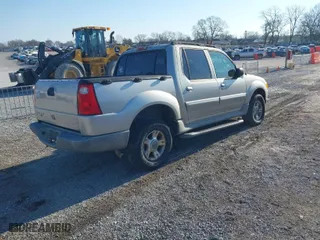 2003 Ford Explorer Sport Trac XLS with VIN 1FMZU77E13UC07611, listed as a IAAI auction lot 41401679 with 244,126 mi miles. Bid and sale history available at carsss.com. Image 4.