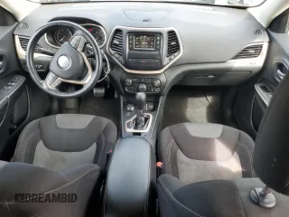2014 Jeep Cherokee Altitude with VIN 1C4PJMCB0EW315465, listed as a Copart auction lot 55976335 with 124,687 mi miles and Clean Title. Bid and sale history available at DreamBid. Image 8.