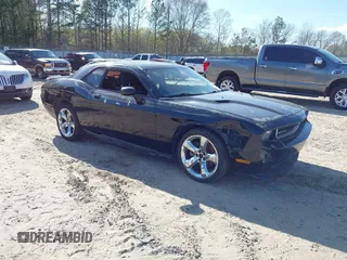 2013 Dodge Challenger SXT z VIN 2C3CDYAG0DH629128, wystawiony jako IAAI lot #41890327 z przebiegiem Nie podano mil oraz . Historia ofert i sprzedaży dostępna na DreamBid. Obrazek 1.