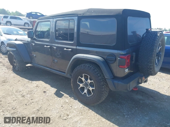 2021 Jeep Wrangler Unlimited Rubicon with VIN 1C4HJXFN5MW509483, listed as a IAAI auction lot 42245703 with 59,461 mi miles and . Bid and sale history available at DreamBid. Image 3.