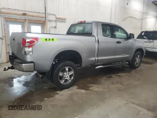 2007 Toyota Tundra SR5 with VIN 5TBBT54197S451993, listed as a Copart auction lot 57887565 with 284,398 mi miles and Salvage title. Bid and sale history available at DreamBid. Image 3.