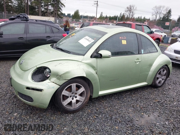 2006 Volkswagen New Beetle Coupe with VIN 3VWRW31C06M402944, listed as a IAAI auction lot 41858922 with 97,518 mi miles. Bid and sale history available at carsss.com. Image 14.