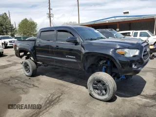 2019 Toyota Tacoma SR z VIN 3TMCZ5AN1KM253032, wystawiony jako Copart lot #52598445 z przebiegiem 69 489 mil mil oraz Szkoda całkowita • Salvage title. Historia ofert i sprzedaży dostępna na DreamBid. Obrazek 4.
