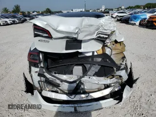 2020 Tesla Model 3 Standard Range Plus z VIN 5YJ3E1EA3LF632566, wystawiony jako Copart lot #56416625 z przebiegiem Nie podano mil oraz Nie do naprawy • Non repairable. Historia ofert i sprzedaży dostępna na DreamBid. Obrazek 6.