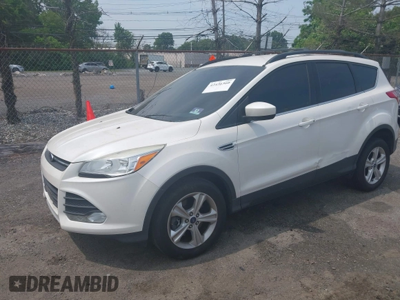 2013 Ford Escape SE z VIN 1FMCU9GXXDUD82847, wystawiony jako IAAI lot #42436360 z przebiegiem 142 071 mil mil oraz . Historia ofert i sprzedaży dostępna na DreamBid. Obrazek 16.