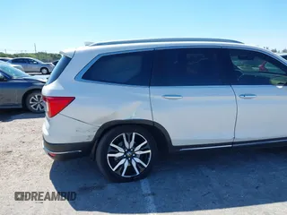 2022 Honda Pilot Touring 7-Passenger с VIN 5FNYF5H66NB034248, выставлен на аукционе IAAI как лот 41777362 с пробегом 26 611 миль миль и . История ставок и продаж доступна на DreamBid. Изображение 6.