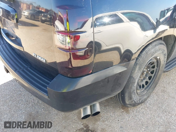 2007 Chevrolet Tahoe LTZ with VIN 1GNFC13J67R245233, listed as a IAAI auction lot 41726159 with 203,841 mi miles and . Bid and sale history available at DreamBid. Image 14.