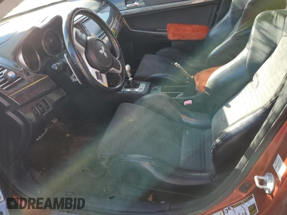 2009 Mitsubishi Lancer with VIN JA3AY68VX9U612338, listed as a Copart auction lot 83156914 with 249,338 mi miles and Salvage Title. Bid and sale history available at DreamBid. Image 7.