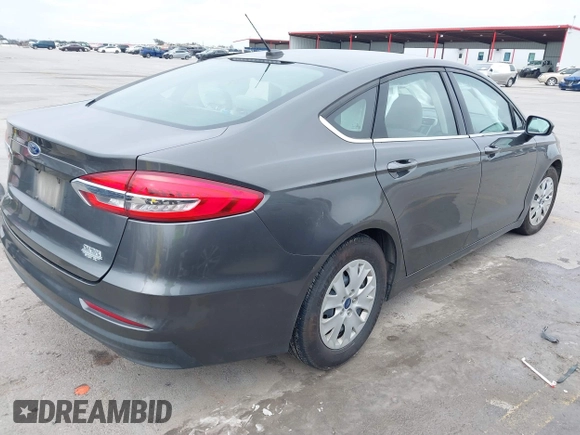 2019 Ford Fusion S with VIN 3FA6P0G79KR215541, listed as a IAAI auction lot 41626638 with 73,751 mi miles and . Bid and sale history available at DreamBid. Image 4.