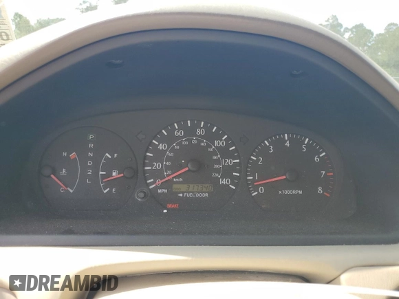 2002 Toyota Solara SE z VIN 2T1CE22P42C005554, wystawiony jako Copart lot #57756005 z przebiegiem 317 340 mil mil oraz Szkoda całkowita • Salvage title. Historia ofert i sprzedaży dostępna na DreamBid. Obrazek 9.