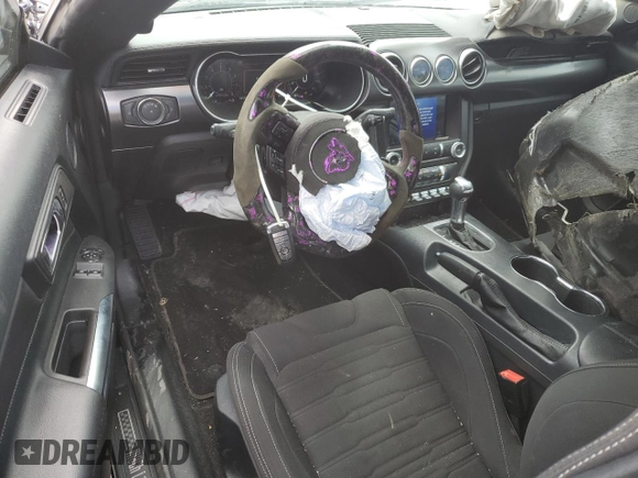 2021 Ford Mustang Mach 1 with VIN 1FA6P8R06M5555038, listed as a Copart auction lot 56496525 with 16,174 mi miles and Salvage title. Bid and sale history available at DreamBid. Image 8.
