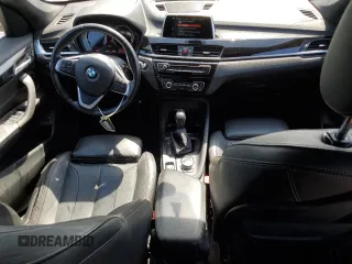 2018 BMW X1 sDrive28i with VIN WBXHU7C32J5L07666, listed as a Copart auction lot 54173465 with 132,514 mi miles and Clean Title. Bid and sale history available at DreamBid. Image 8.