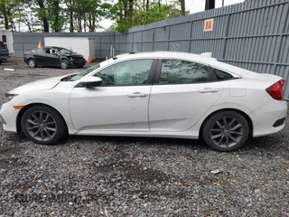 2019 Honda Civic EX z VIN 19XFC1F35KE200536, wystawiony jako IAAI lot #42198146 z przebiegiem 7 231 mil mil oraz . Historia ofert i sprzedaży dostępna na DreamBid. Obrazek 13.
