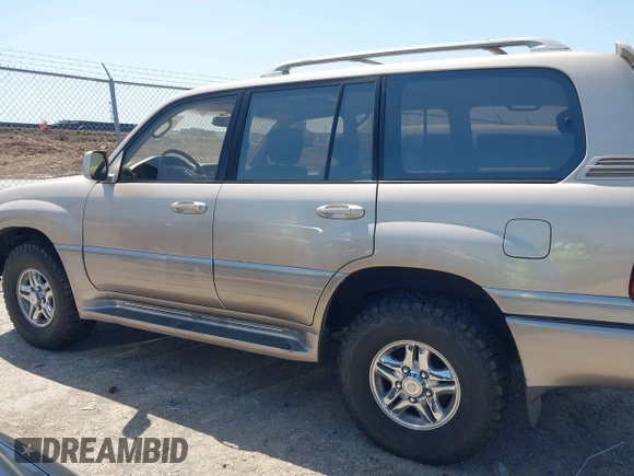2001 Lexus LX 470 with VIN JTJHT00W613510736, listed as a IAAI auction lot 42005639 with 274,227 mi miles and . Bid and sale history available at carsss.com. Image 14.