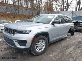 2023 Jeep Grand Cherokee Altitude with VIN 1C4RJHAG9P8909798, listed as a IAAI auction lot 41411422 with 15,960 mi miles. Bid and sale history available at carsss.com. Image 2.