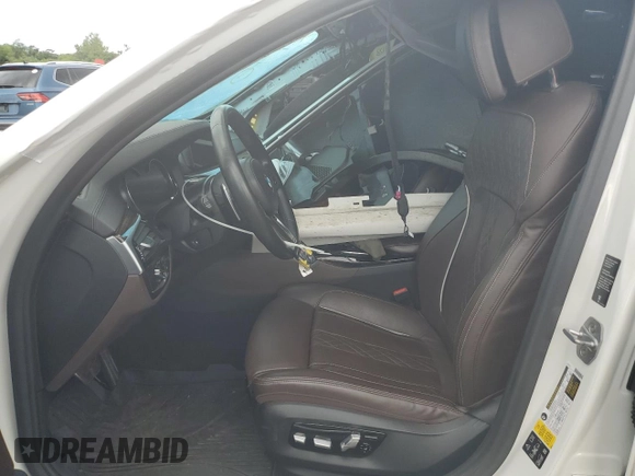 2018 BMW 5 Series M550i xDrive with VIN WBAJB9C5XJB035996, listed as a Copart auction lot 61459425 with Not provided miles and Salvage title. Bid and sale history available at DreamBid. Image 7.