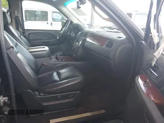 2008 Chevrolet Suburban LTZ with VIN 1GNFK16328R161721, listed as a IAAI auction lot 42130017 with 242,266 mi miles. Bid and sale history available at carsss.com. Image 5.