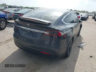 2018 Tesla Model X 75D with VIN 5YJXCDE21JF139712, listed as a IAAI auction lot 41905326 with Not Provided miles and . Bid and sale history available at carsss.com. Image 4.