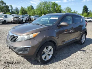 2012 Kia Sportage LX with VIN KNDPBCA25C7252607, listed as a Copart auction lot 59344555 with 119,523 mi miles and Salvage title. Bid and sale history available at DreamBid. Image 1.