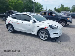 2023 Tesla Model Y Long Range with VIN 7SAYGDEE3PA206757, listed as a IAAI auction lot 39425483 with 5,711 mi miles and . Bid and sale history available at DreamBid. Image 1.