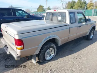 1994 Ford Ranger Splash with VIN 1FTCR15XXRPC53877, listed as a IAAI auction lot 41659917 with 417,570 mi miles. Bid and sale history available at carsss.com. Image 4.