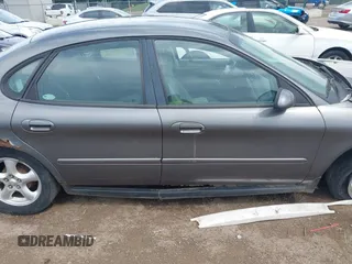 2003 Ford Taurus SE Standard with VIN 1FAFP53U43A233028, listed as a IAAI auction lot 42624211 with 65,364 mi miles and . Bid and sale history available at DreamBid. Image 13.