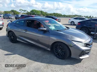 2020 Honda Civic Si Coupe with VIN 2HGFC3A57LH750042, listed as a IAAI auction lot 41623235 with 103,136 mi miles. Bid and sale history available at carsss.com. Image 1.