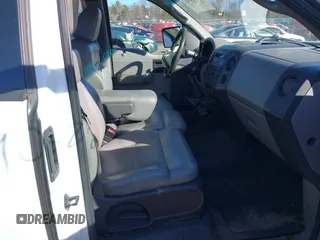 2005 Ford F-150 XL with VIN 1FTRF12285NB41452, listed as a IAAI auction lot 41903892 with 290,233 mi miles. Bid and sale history available at carsss.com. Image 5.